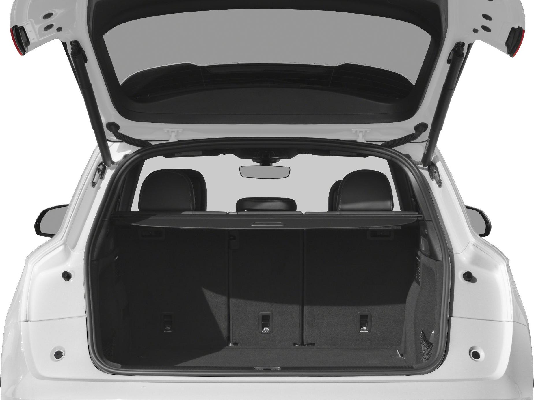 SUV trunk open showing spacious cargo area and rear seats