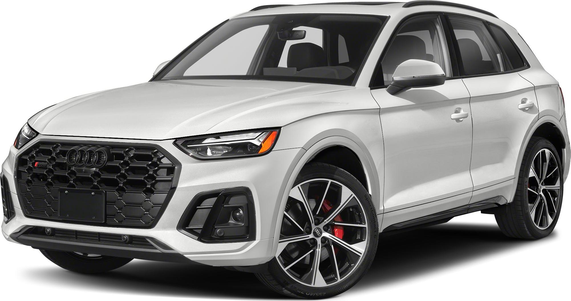 Front angle view with honeycomb grille and sporty alloy wheels.
