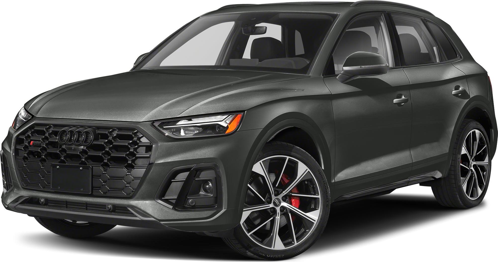 Front black honeycomb grille and sporty alloy wheels with red brake calipers