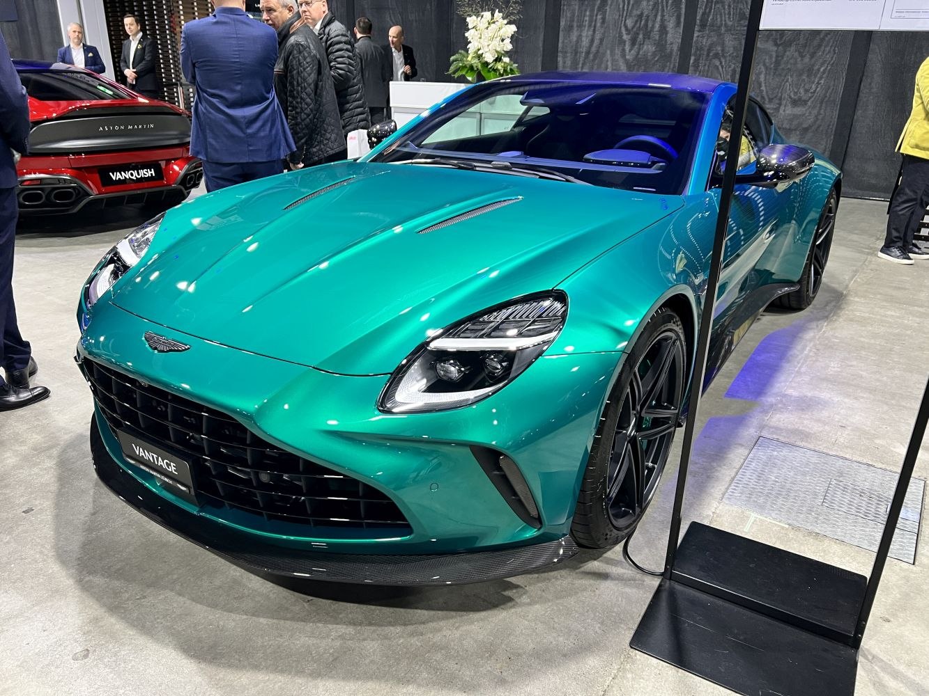 Sleek front design with distinctive headlights and black grille