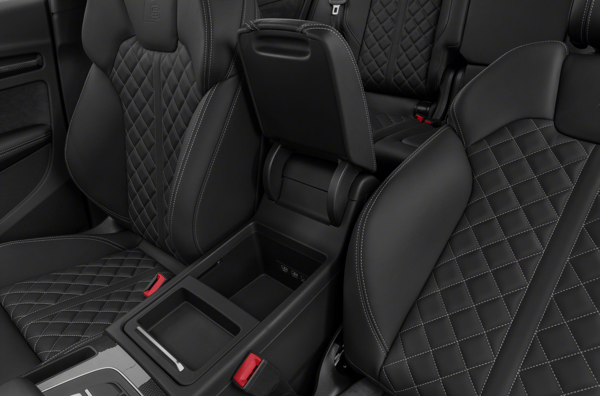 Black quilted leather seats with contrast stitching and open center console