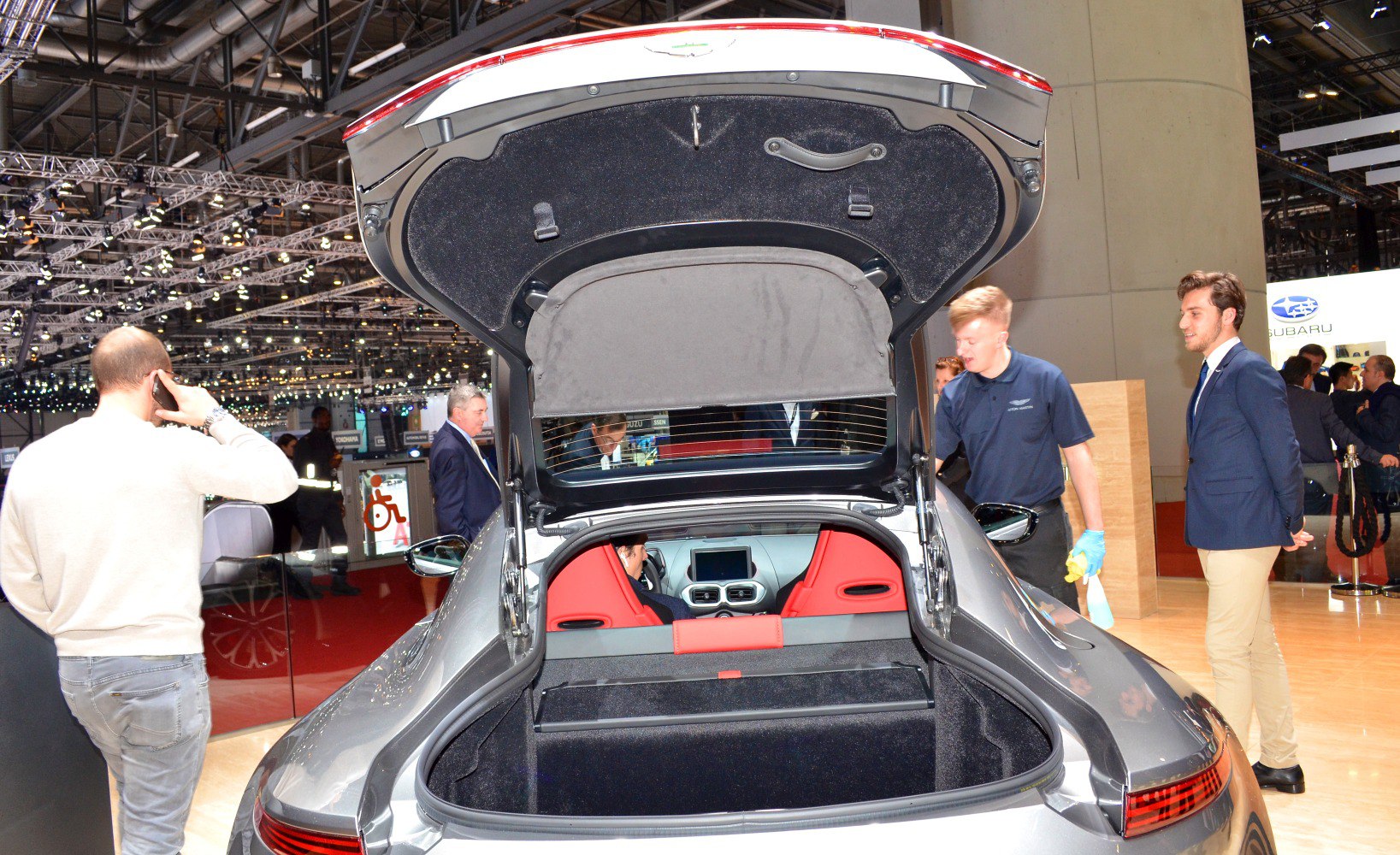 Open trunk with visible interior red seats
