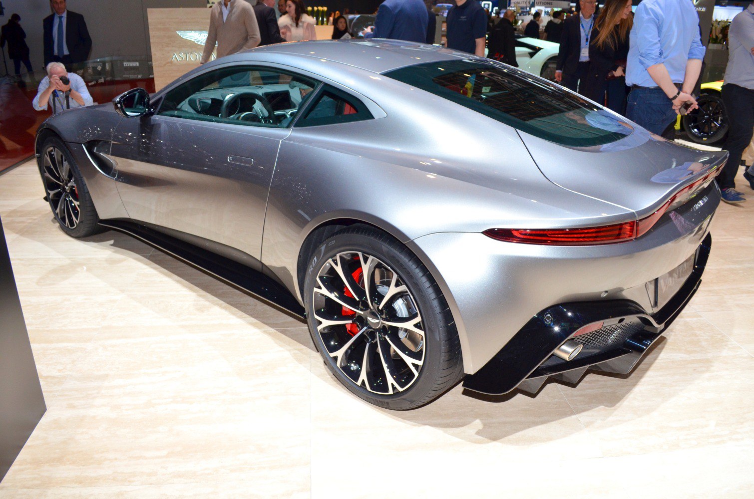 Sleek rear side view with alloy wheels and aerodynamic design.