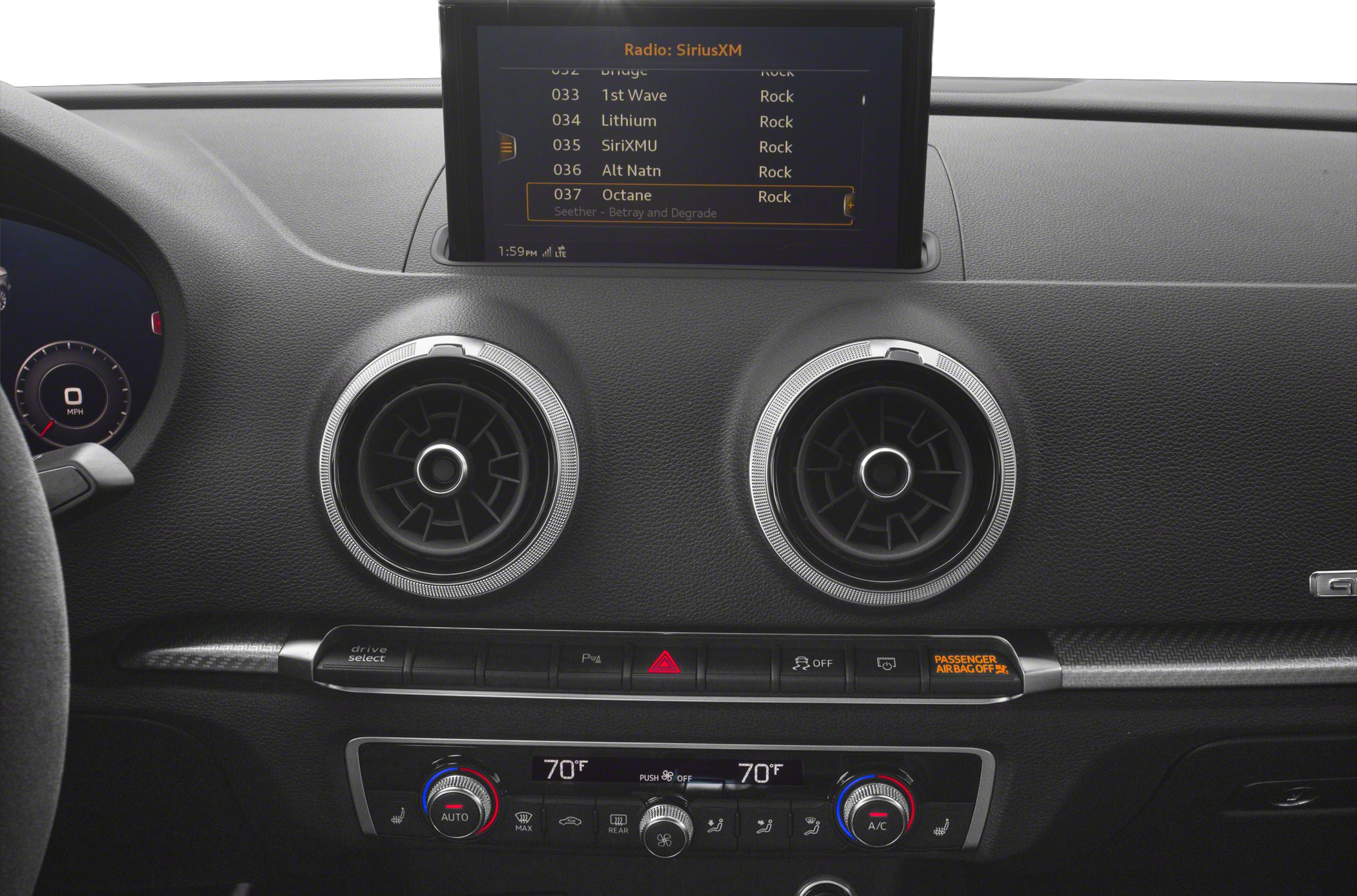 Digital speedometer, dual round air vents, infotainment and climate control panel
