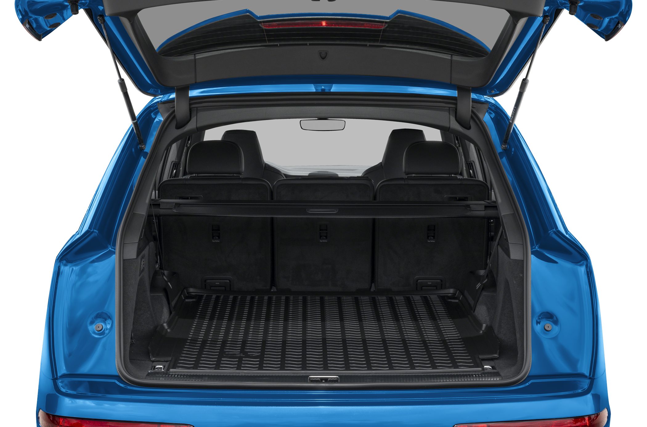 Open rear cargo space with protective floor mat and retractable cover