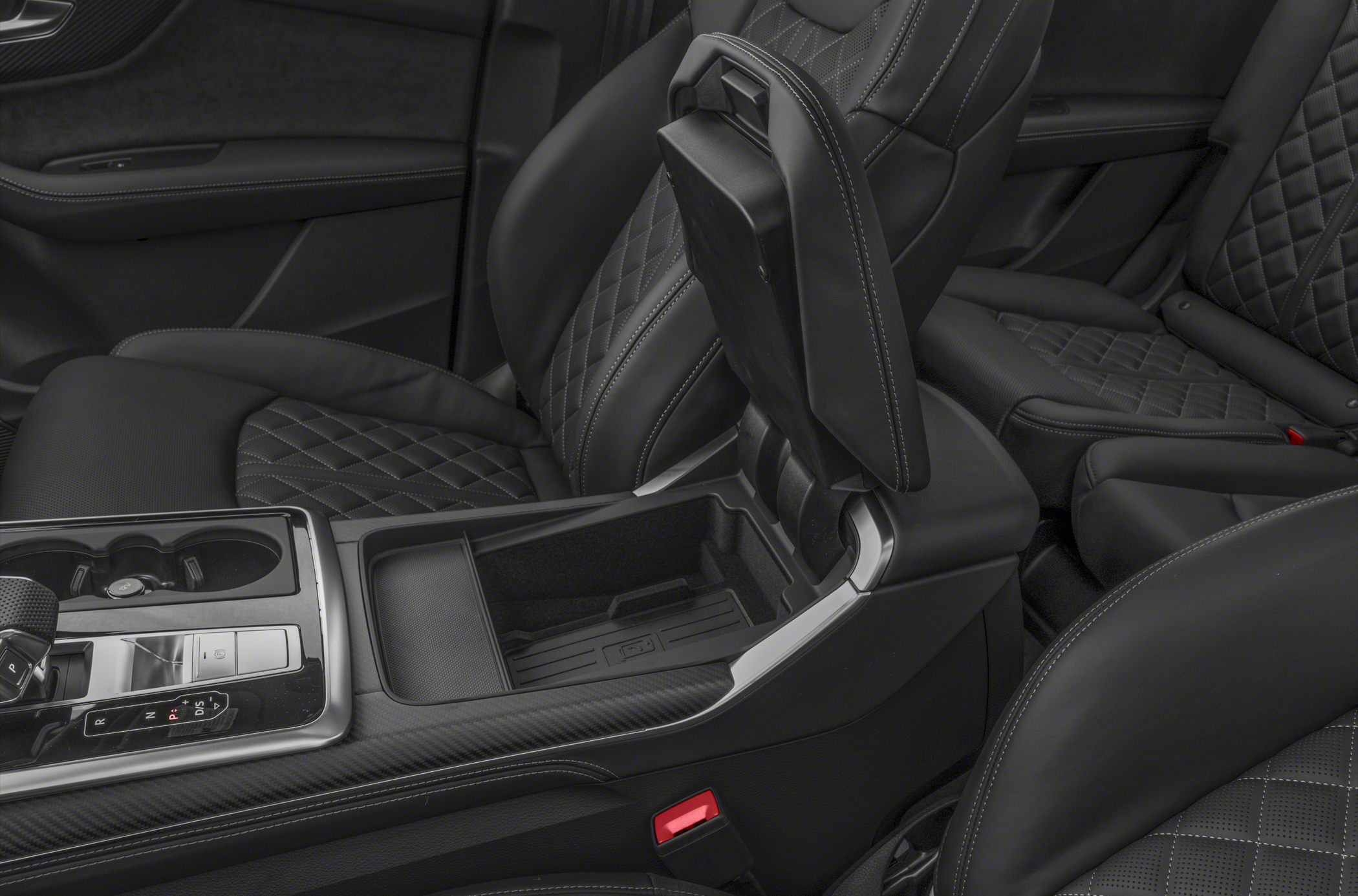 Luxury black diamond-stitched seats and modern center console design