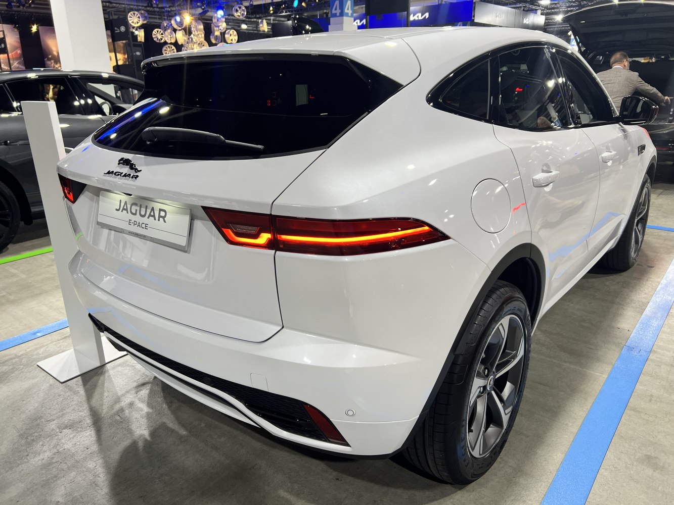 Rear view with modern LED tail lights and sleek SUV design.