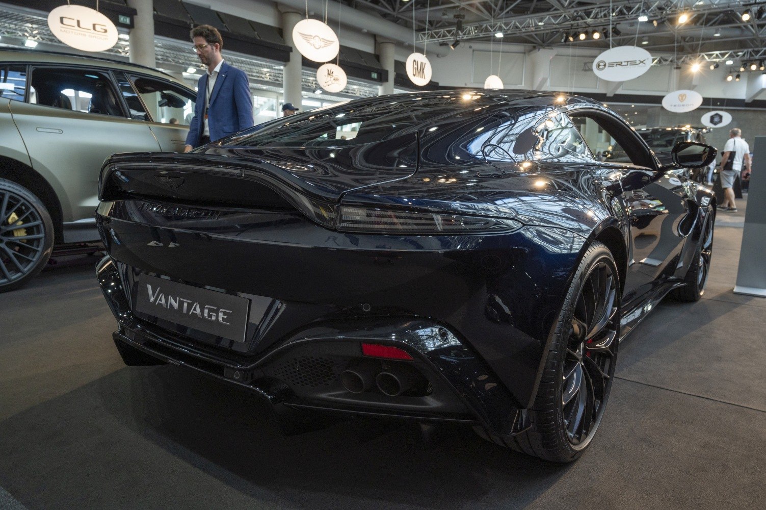Rear view showing tail light and dual exhaust of luxury sports coupe