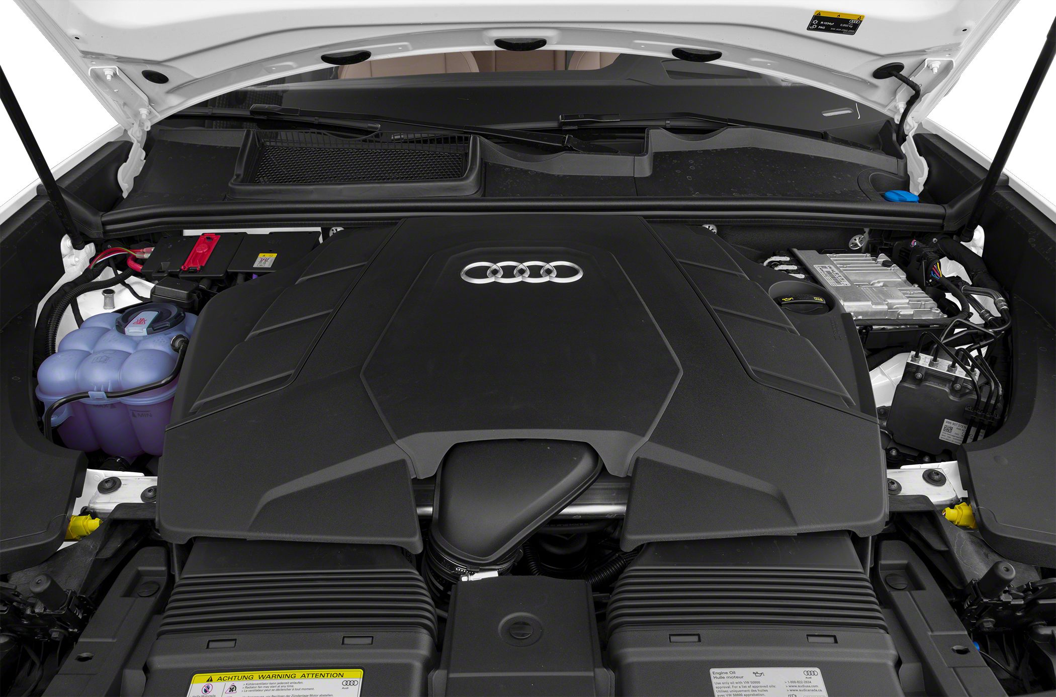 Engine bay close-up with Audi logo and visible powertrain components