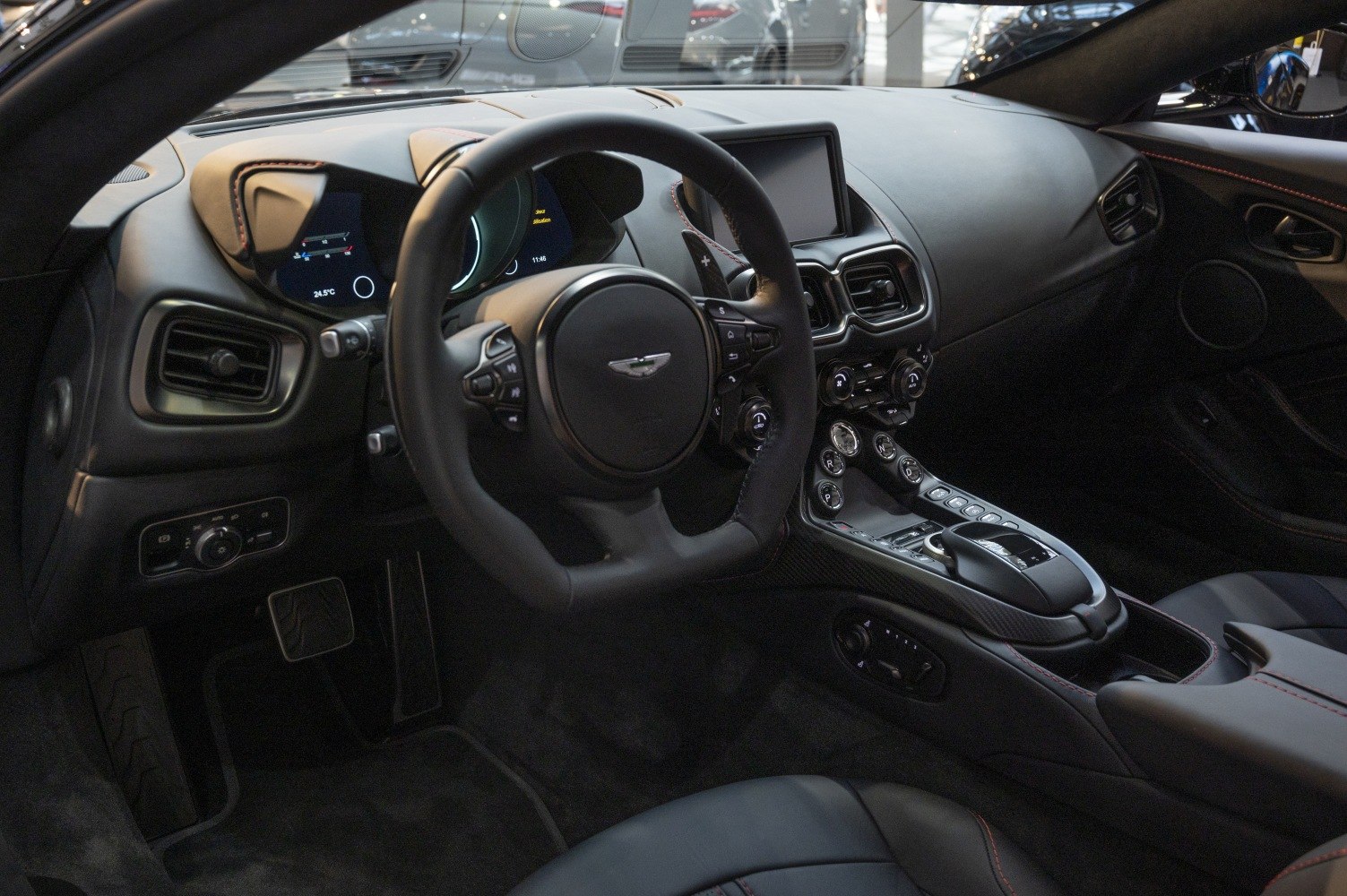 Luxury sports car interior with digital dashboard and multifunction steering wheel