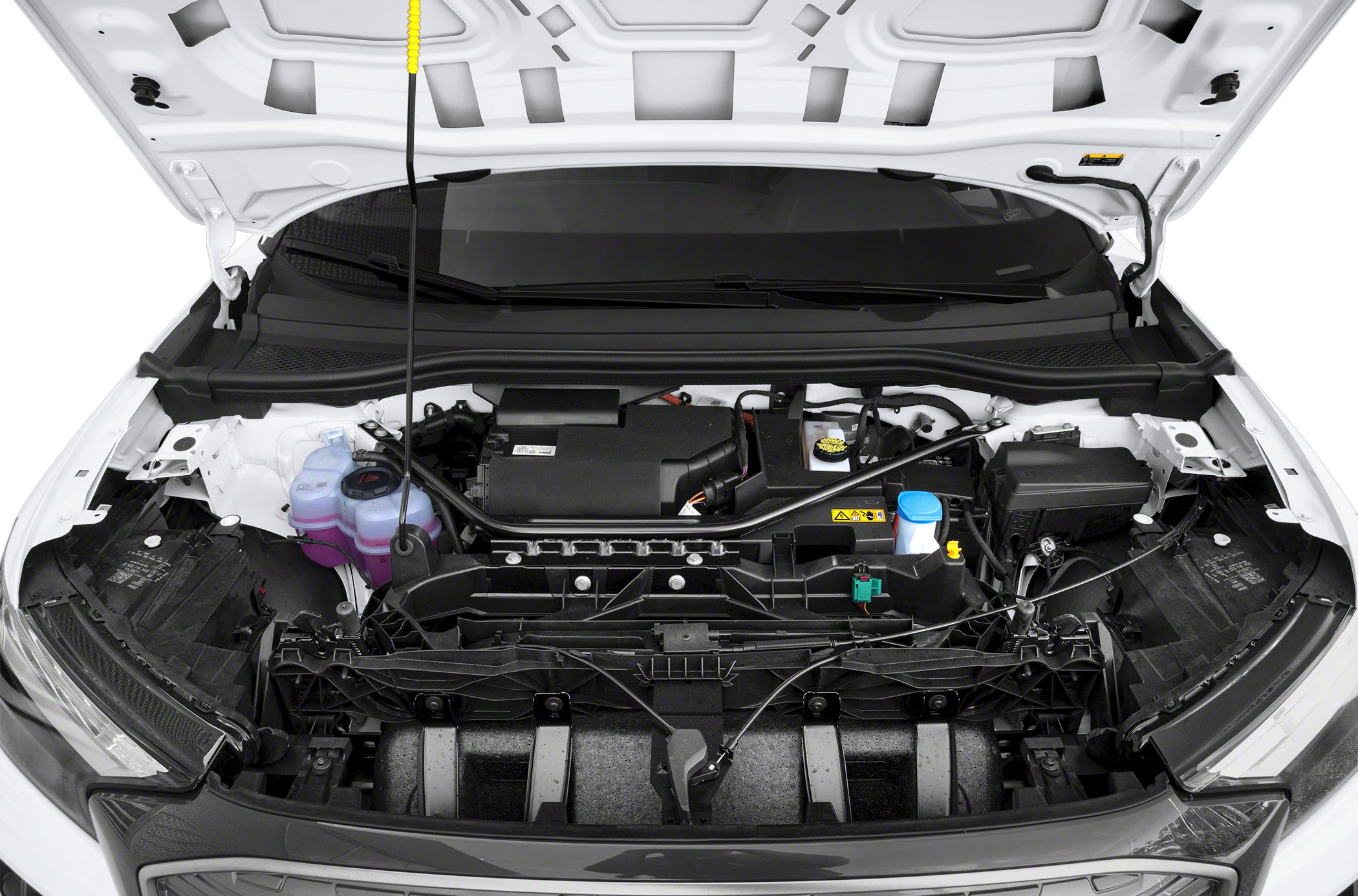 Open electric motor bay with components and fluid reservoirs