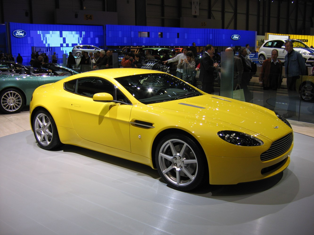 Yellow sports coupe with aerodynamic profile and silver alloy wheels