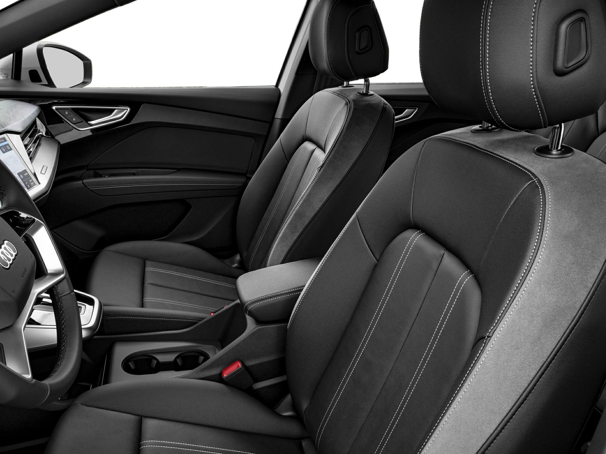 Black front seats with detailed stitching and modern dashboard interior