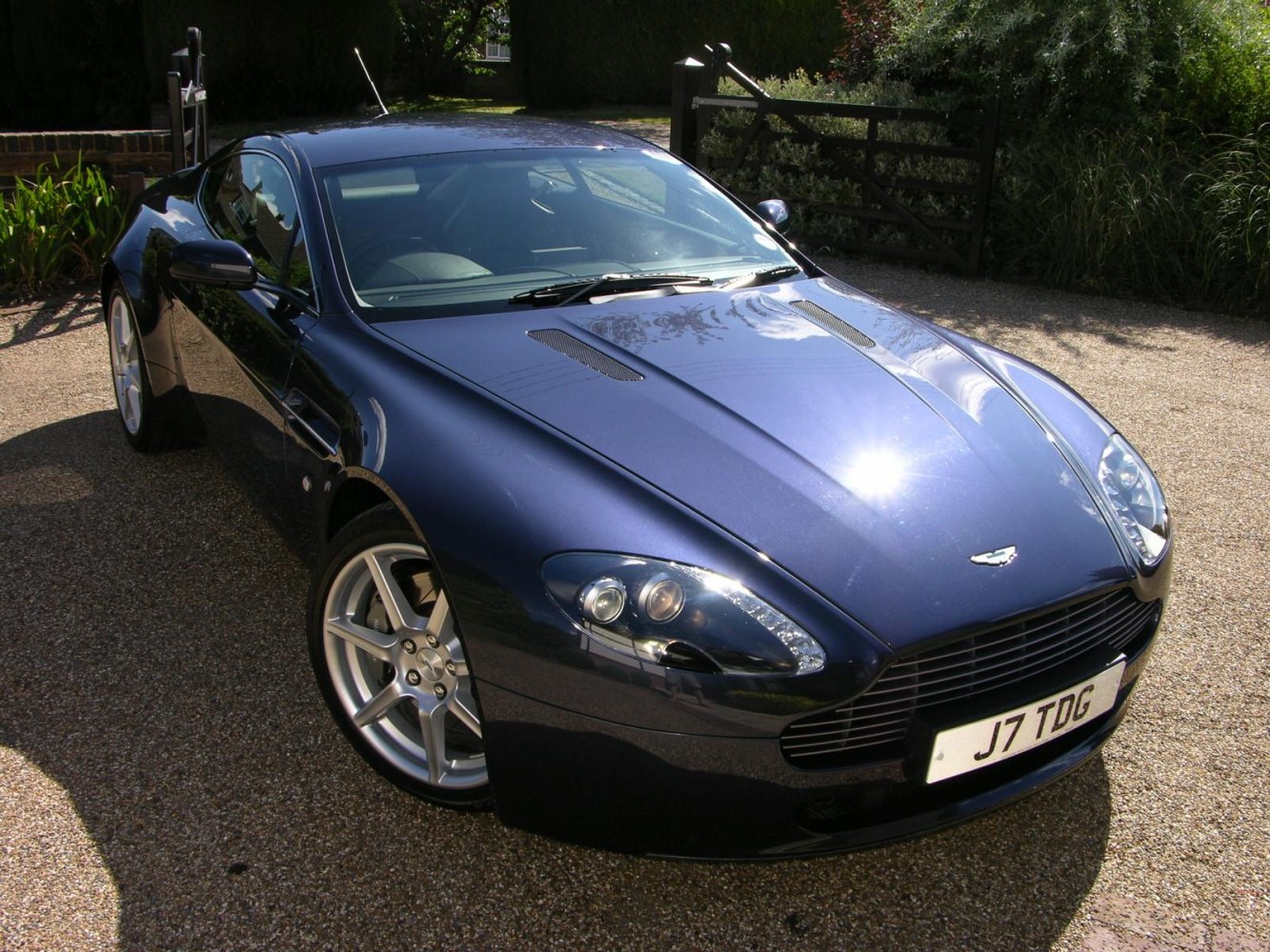 Front and side view with headlights and alloy wheels