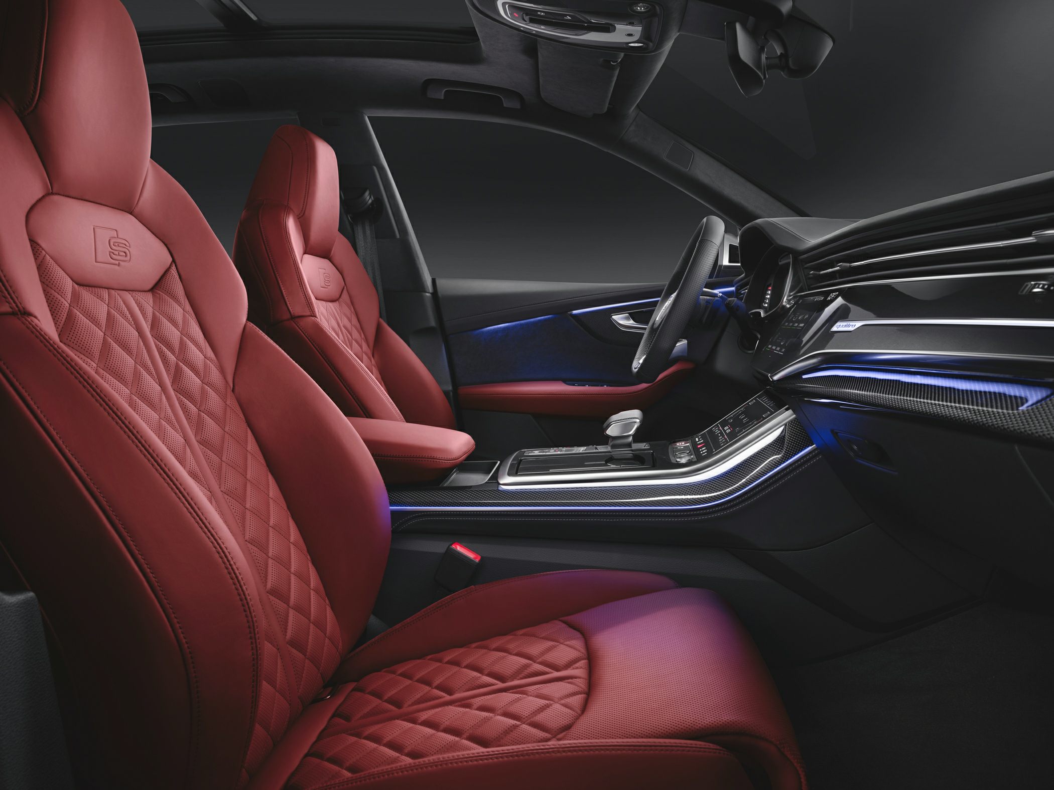 Red leather sport seats with diamond stitching and ambient interior lighting
