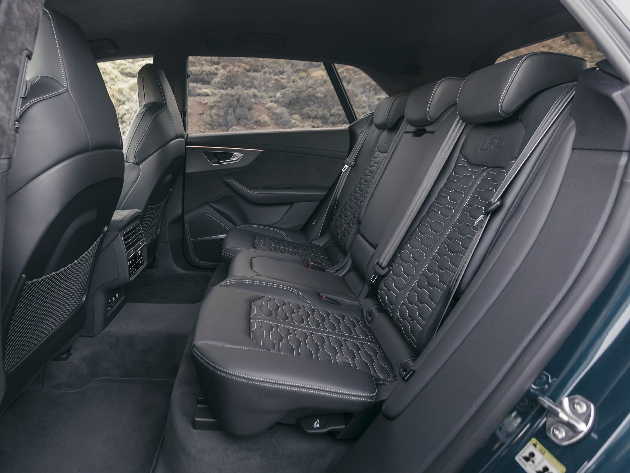 Luxury black leather rear seats with quilted pattern and RS branding