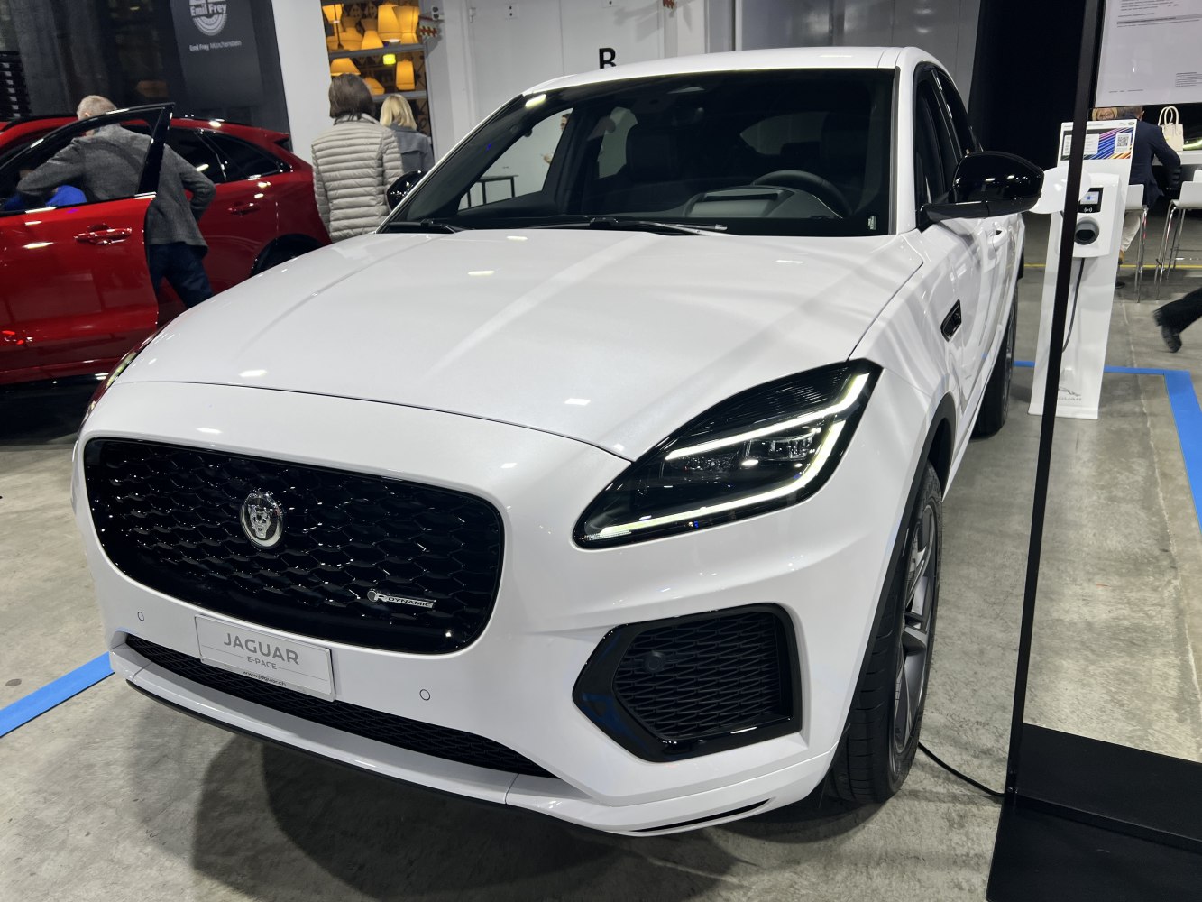 White SUV featuring dynamic front grille and distinctive LED headlights