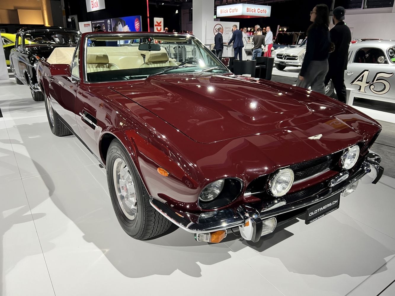 Classic convertible with front headlights and chrome bumper