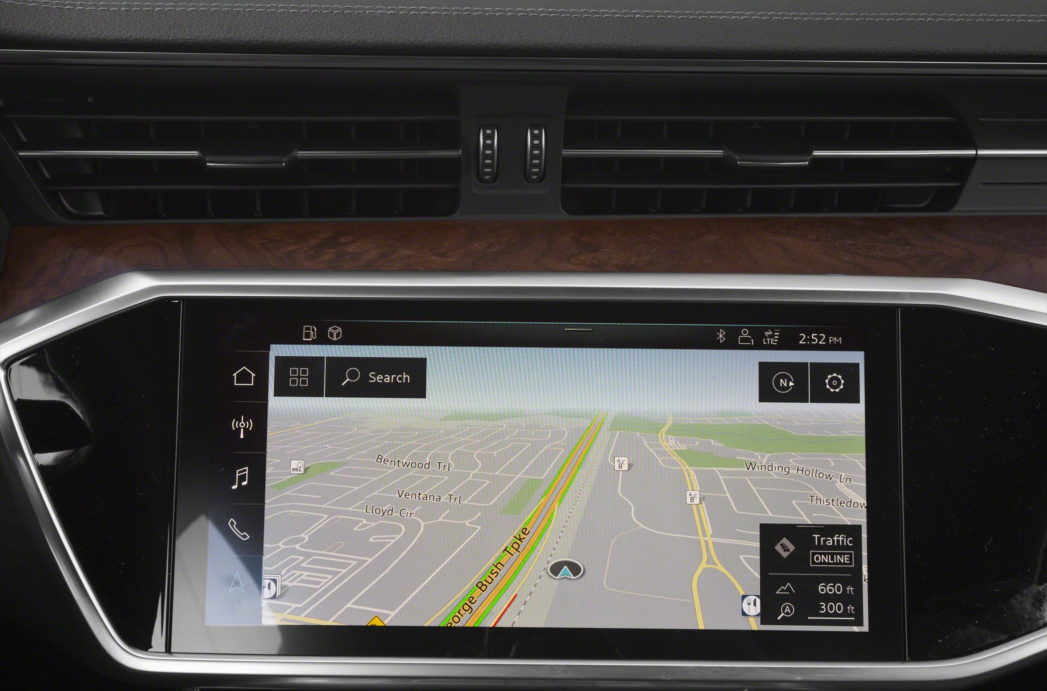 Advanced infotainment touchscreen showing detailed navigation map with traffic updates.