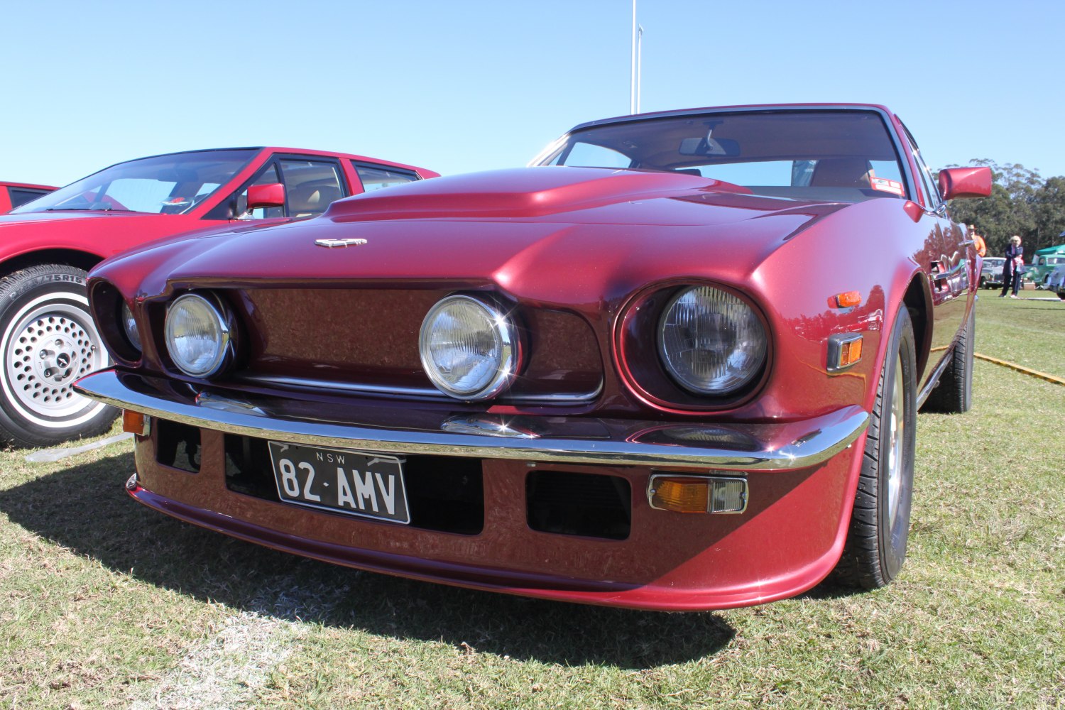 Front grille with distinctive round headlights and chrome bumper.