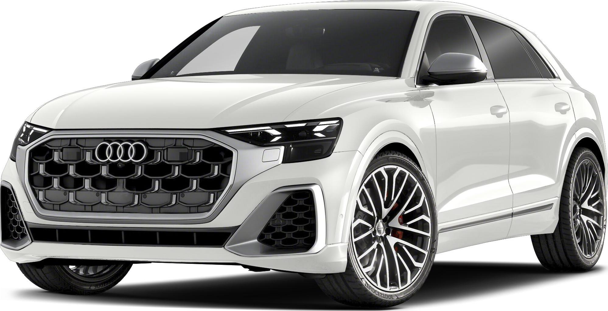 Aggressive front grille and large alloy wheels of a luxury white SUV