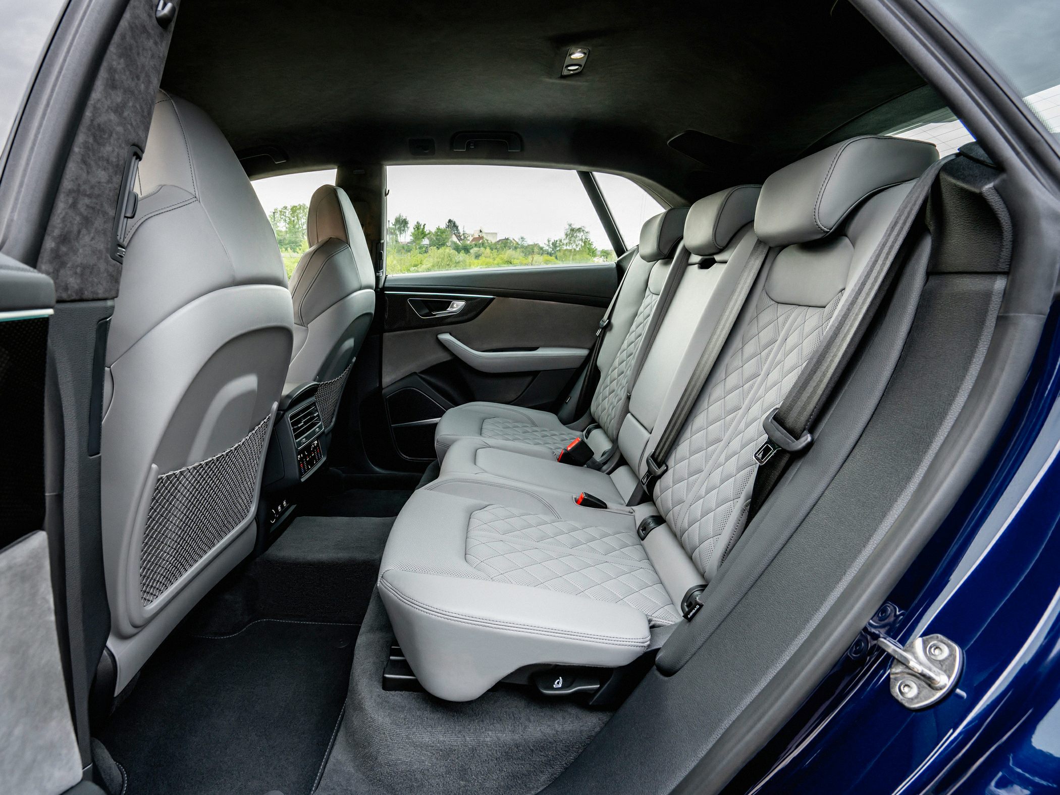 Luxurious quilted leather rear seats in a spacious interior