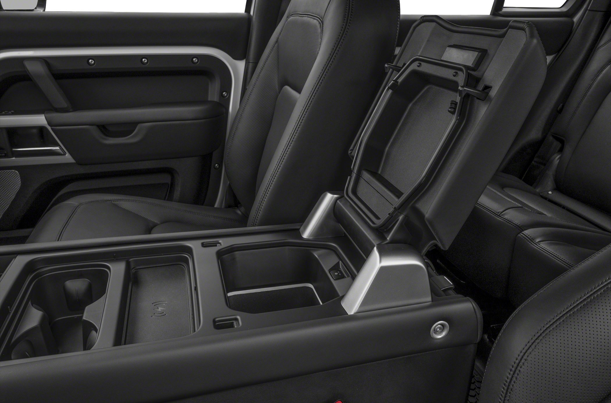 Interior center console with open storage and armrest compartments