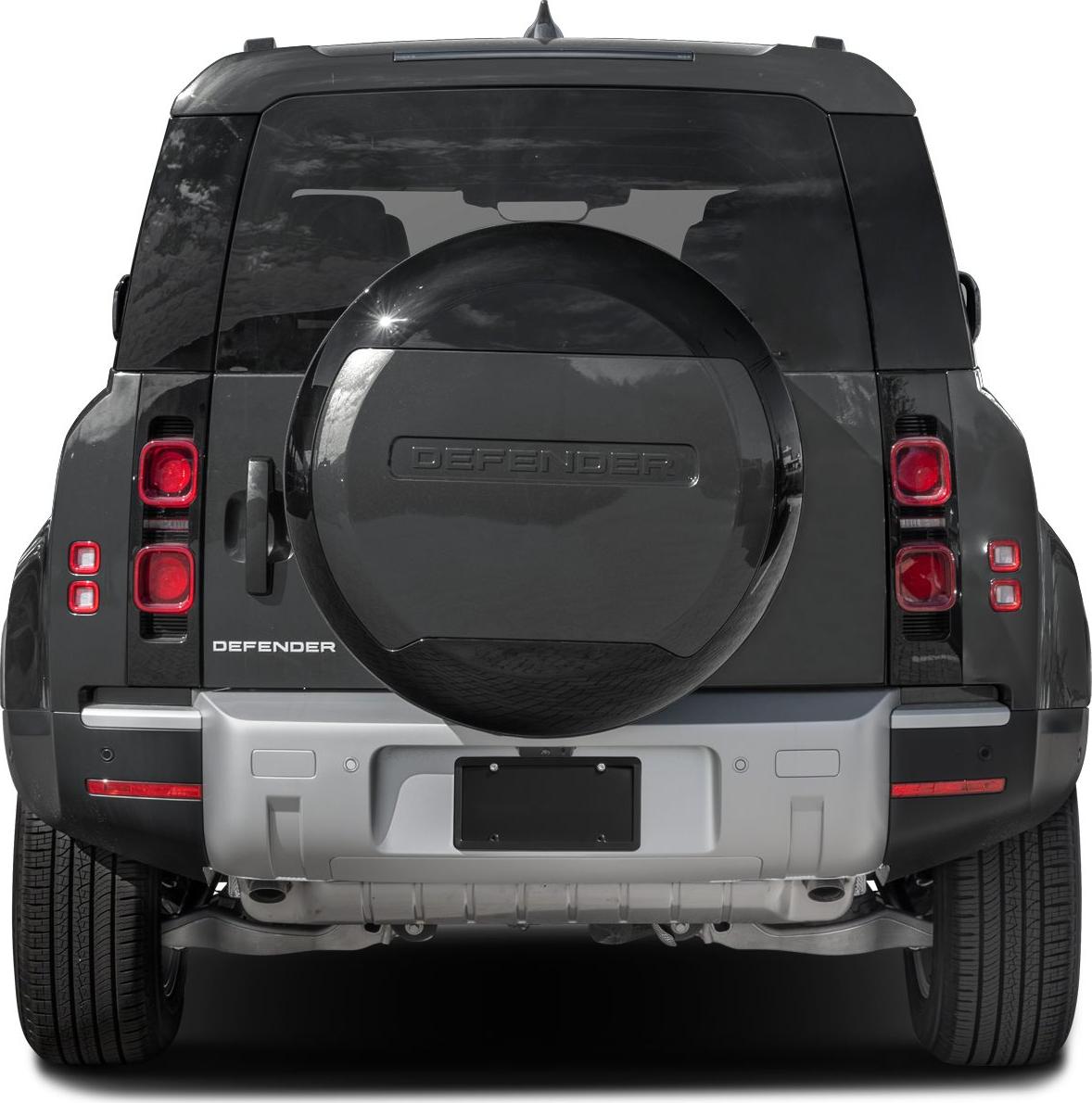 Rear view with prominent spare tire cover and vertically stacked tail lights