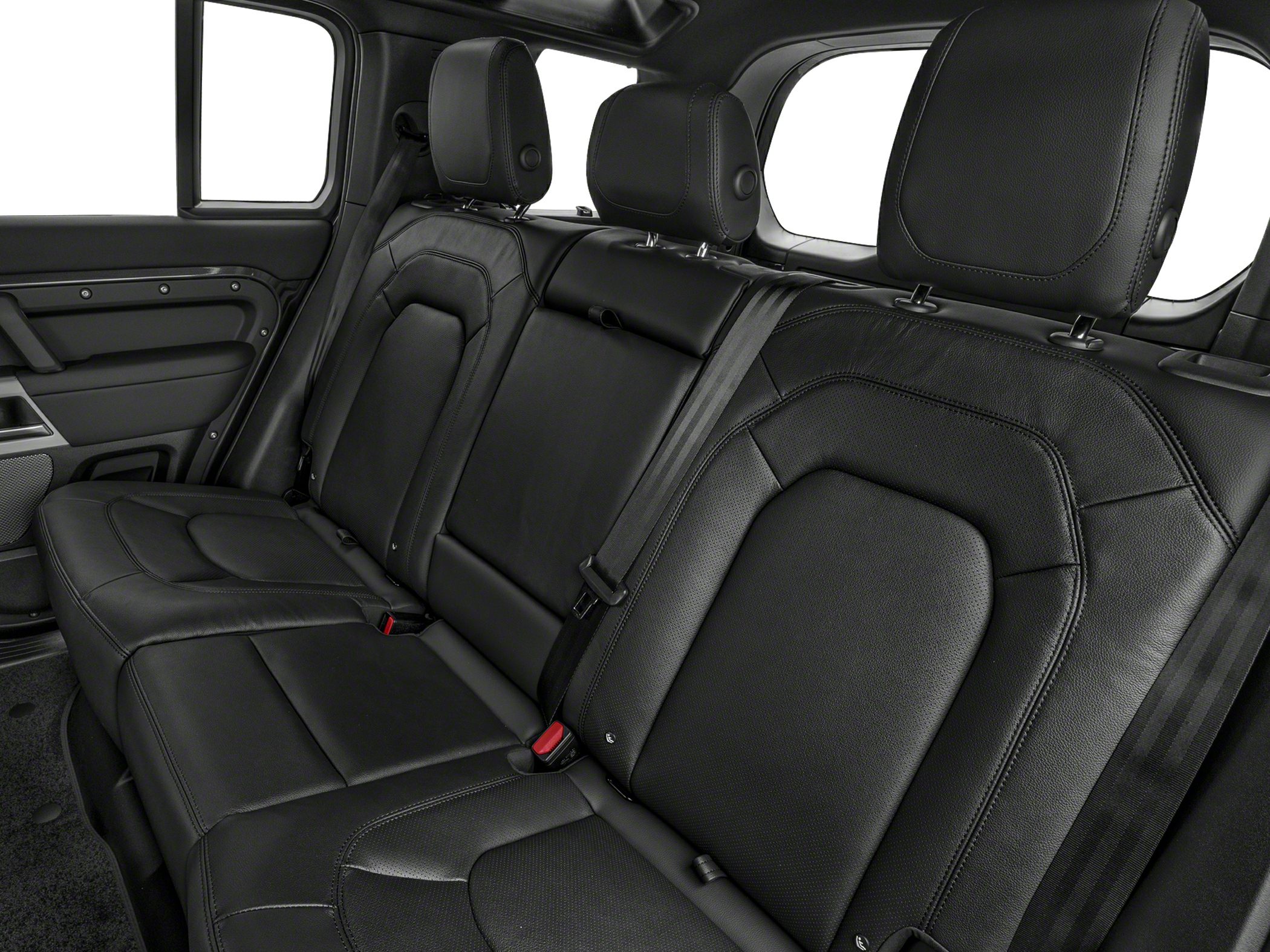 Black leather rear seats with headrests and seat belts.