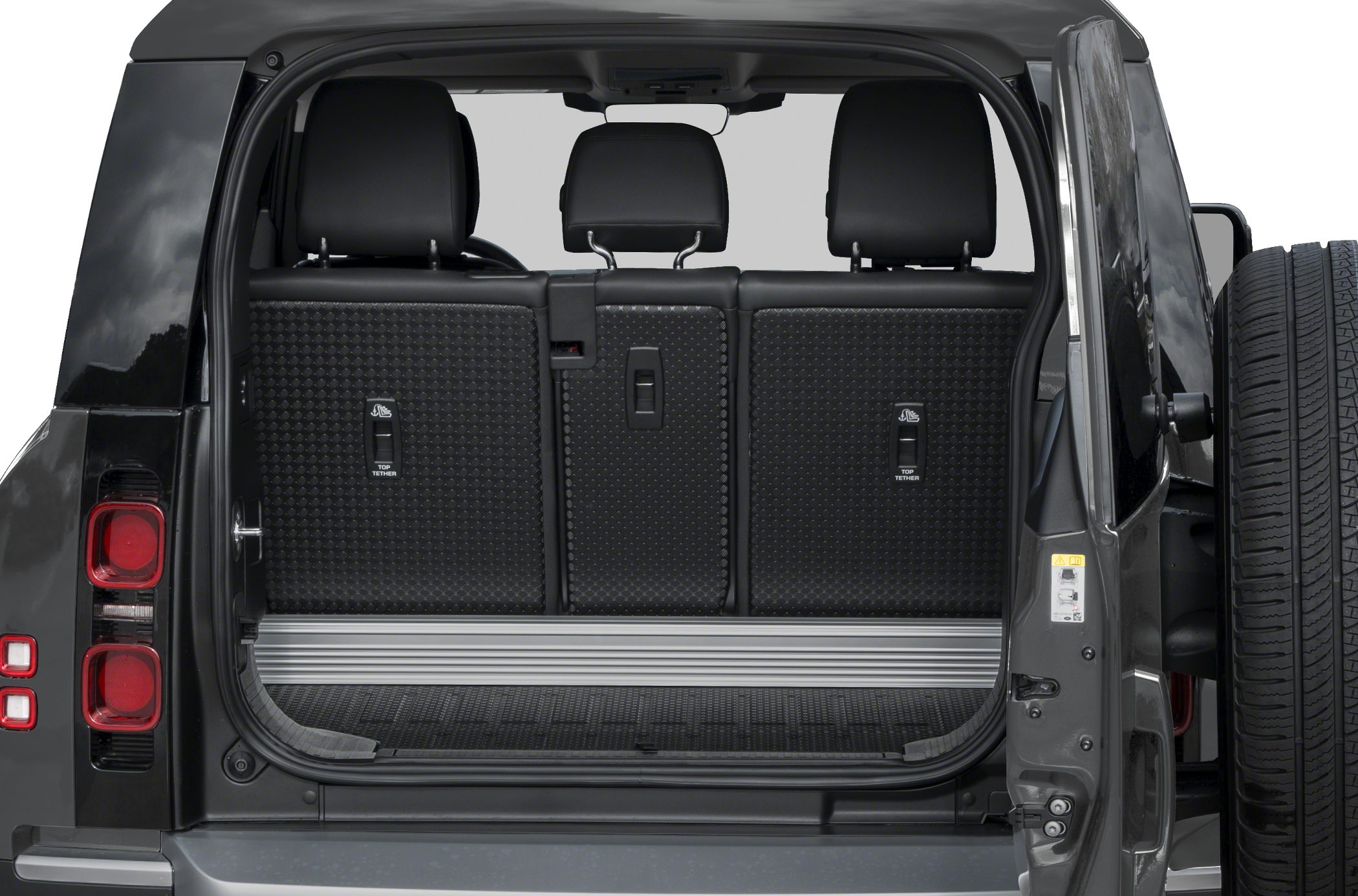 Rear cargo area with seatbacks and open tailgate