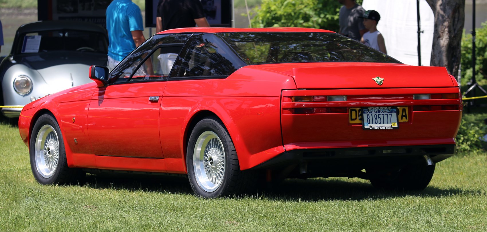 Retro sports coupe with unique rear design and mesh alloy wheels