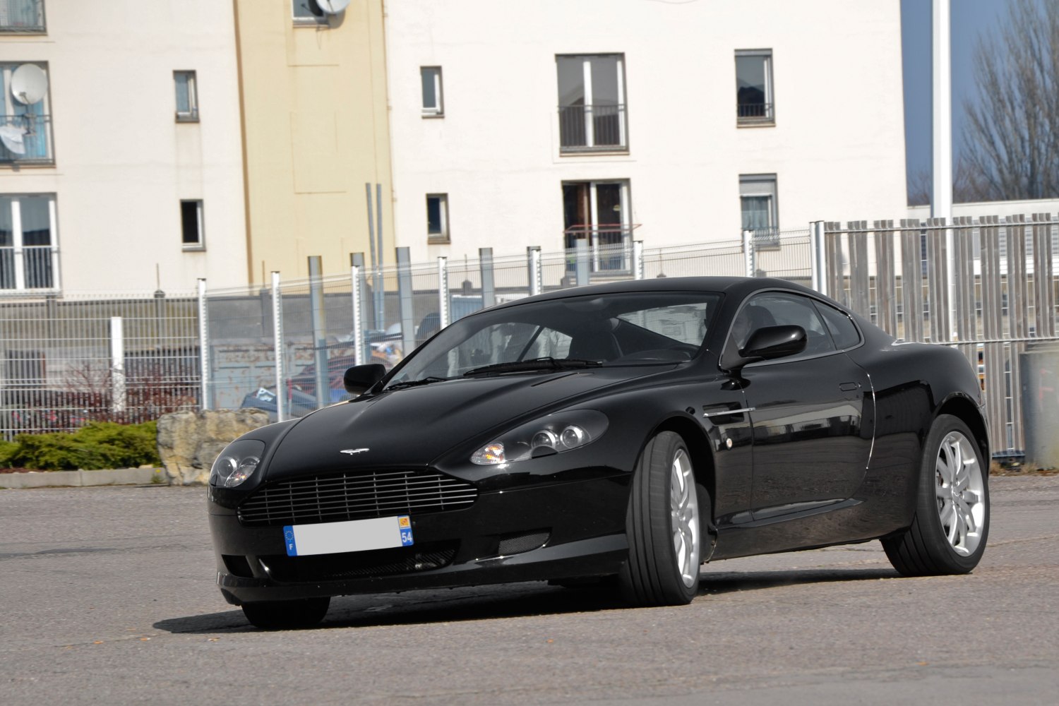 Front view with grille, headlights, and aerodynamic coupe profile