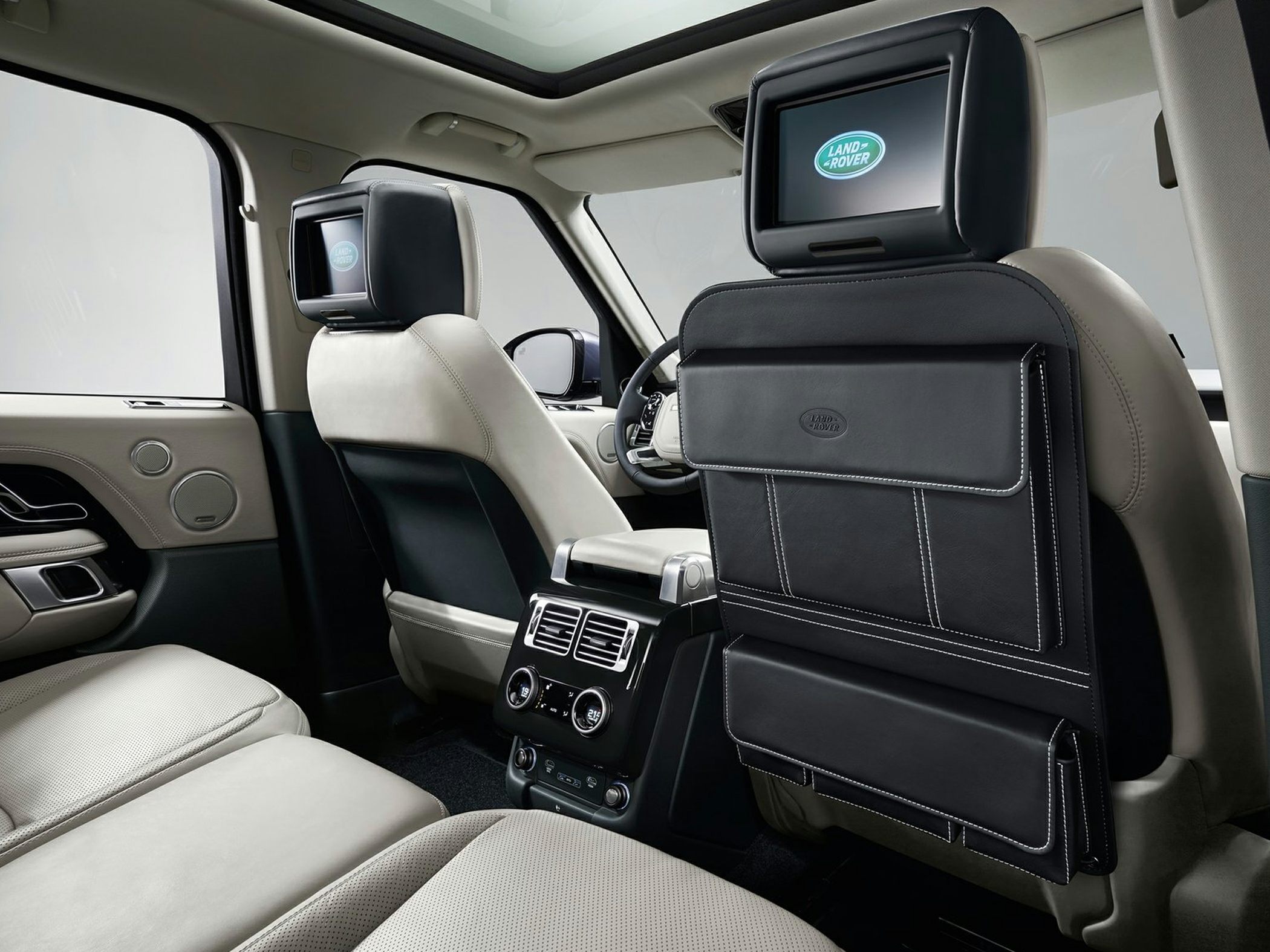 Rear seat entertainment screens with leather upholstery and rear climate controls