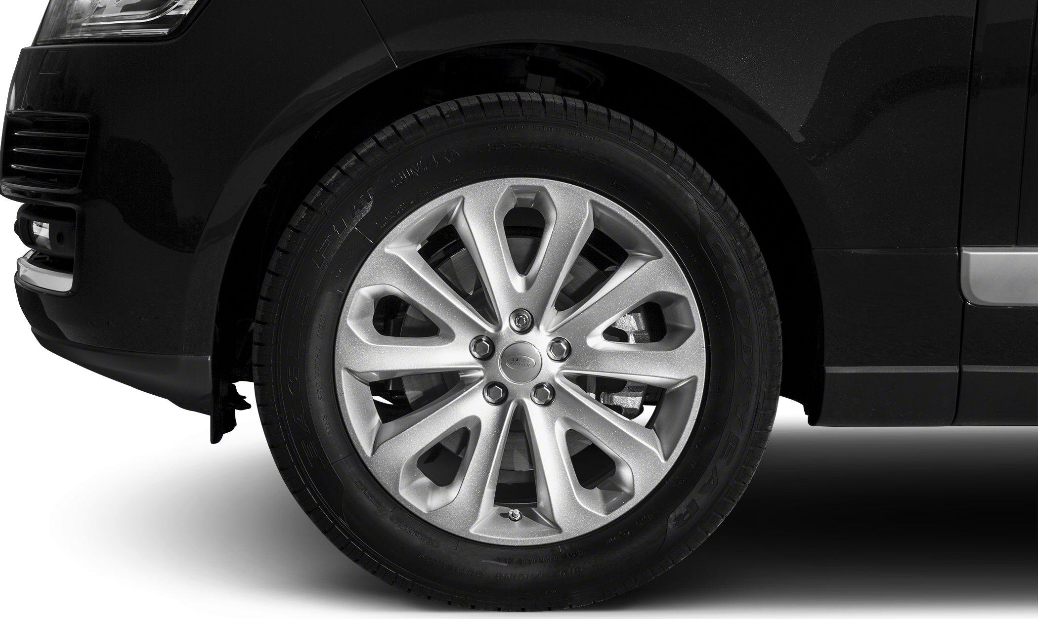 Close-up of alloy wheel and tire with visible brake disc.