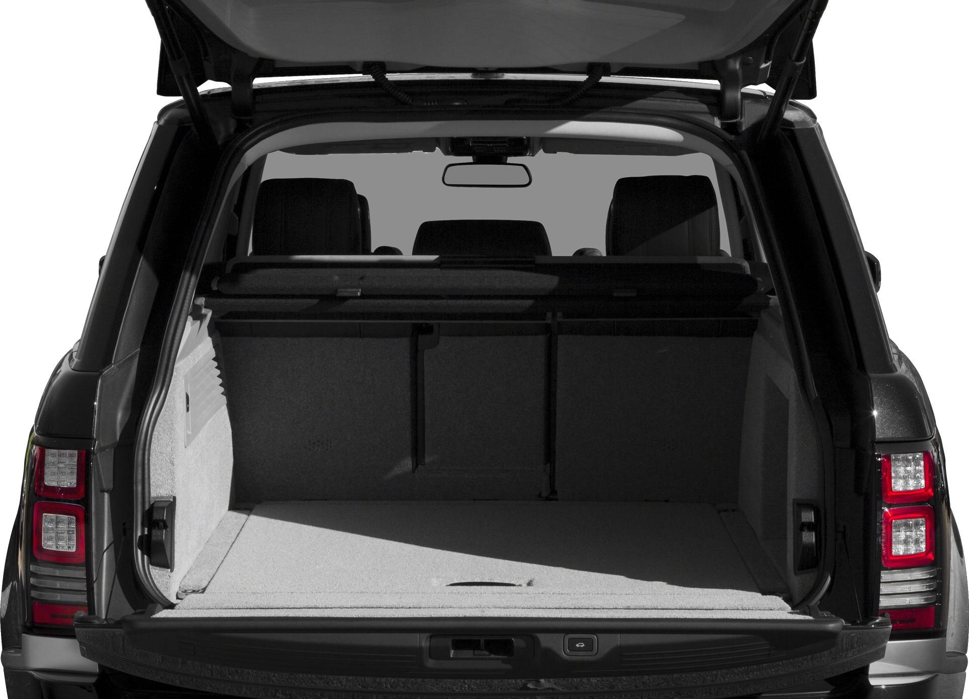 Open rear trunk with spacious cargo area and rear seats visible
