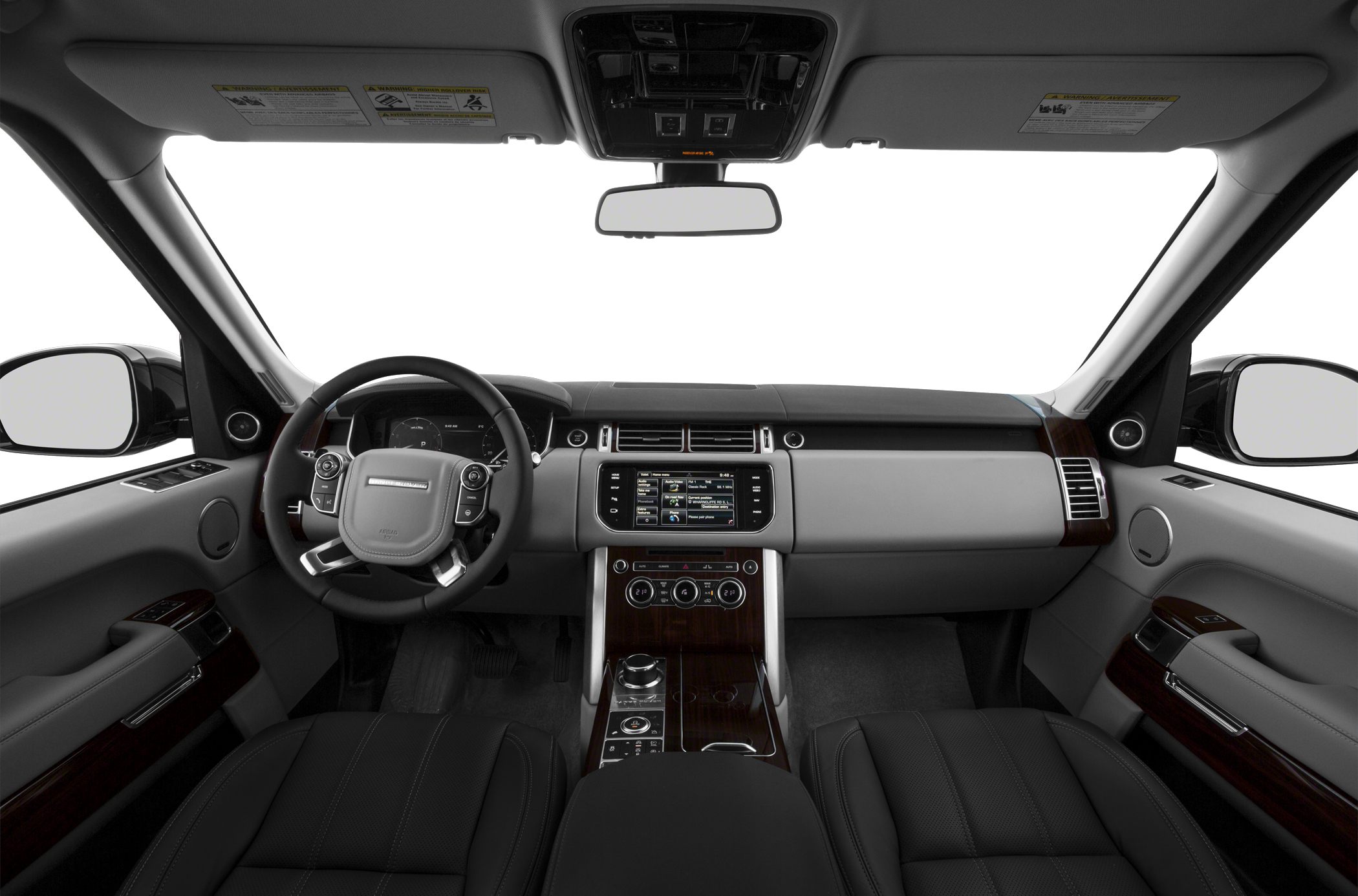 Luxury SUV interior with dashboard, steering wheel, and wood trim