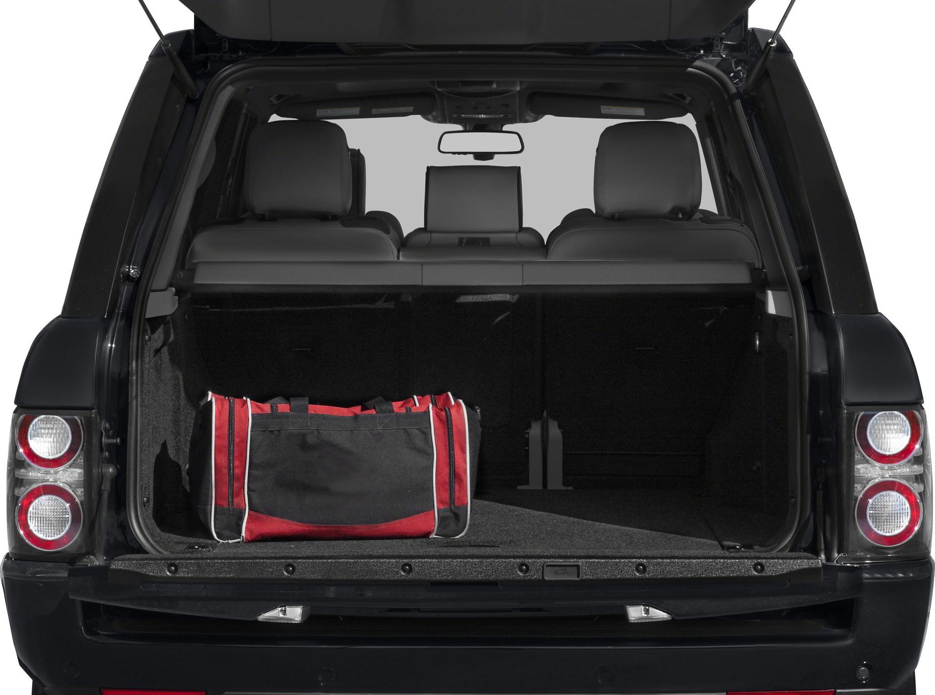 Open rear trunk with spacious cargo area and a travel bag inside