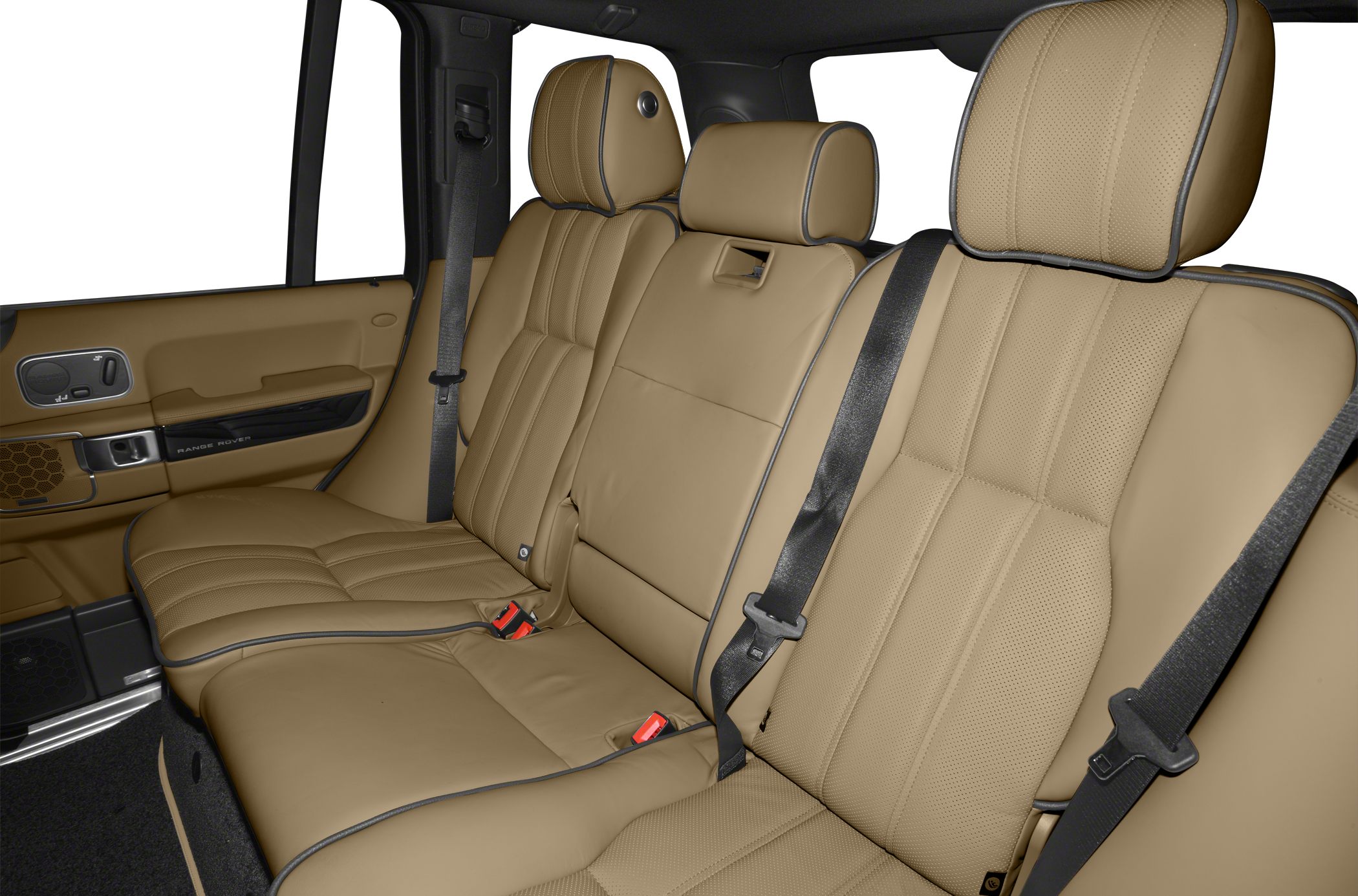 Beige leather rear seats with detailed stitching and seat belts