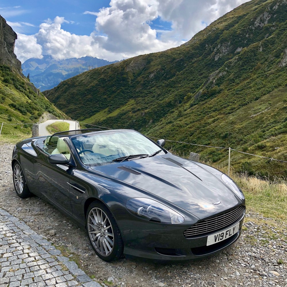 Convertible luxury sports car front-side with aerodynamic features
