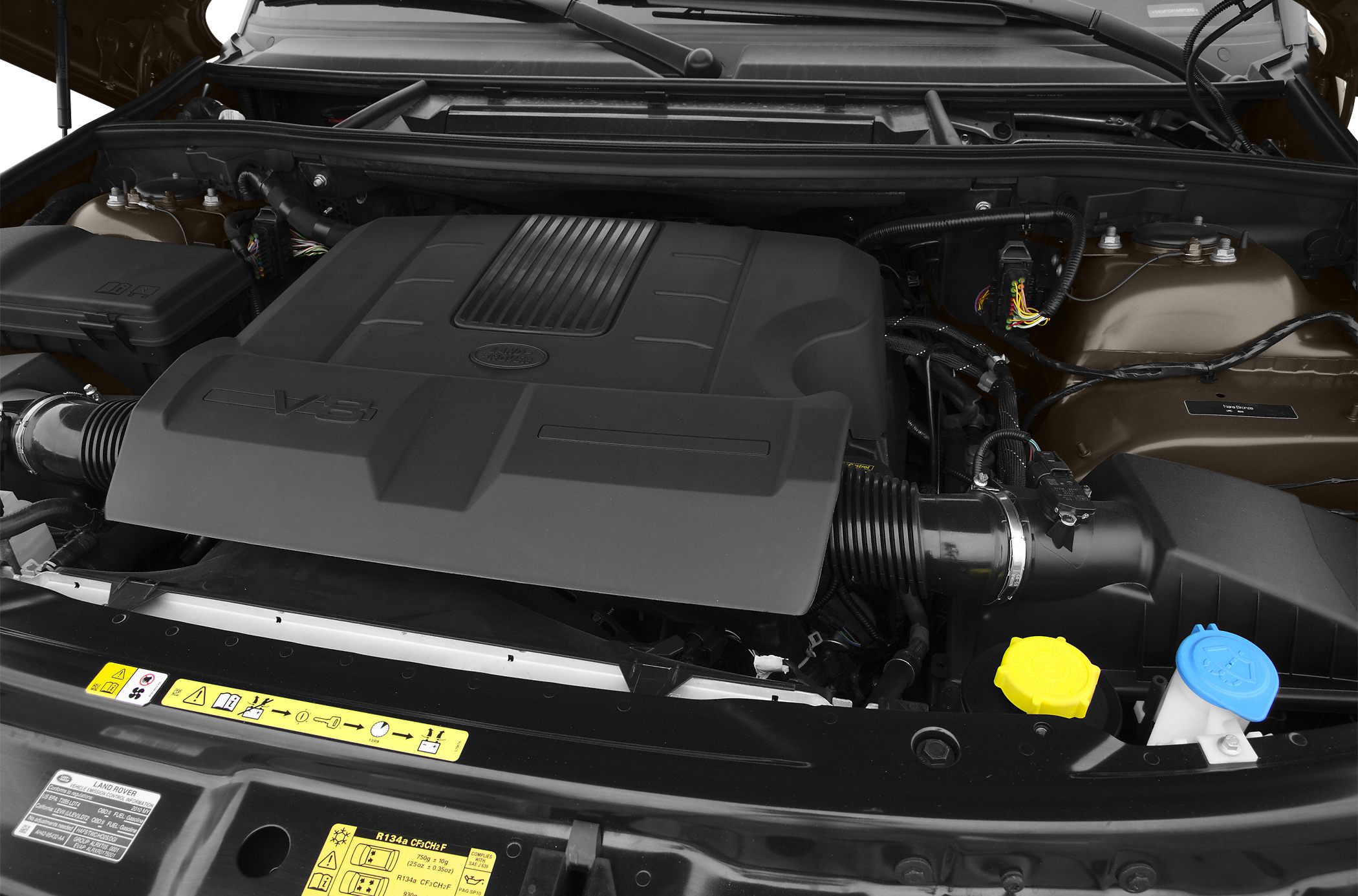 V8 supercharged engine bay with engine cover and fluid reservoirs