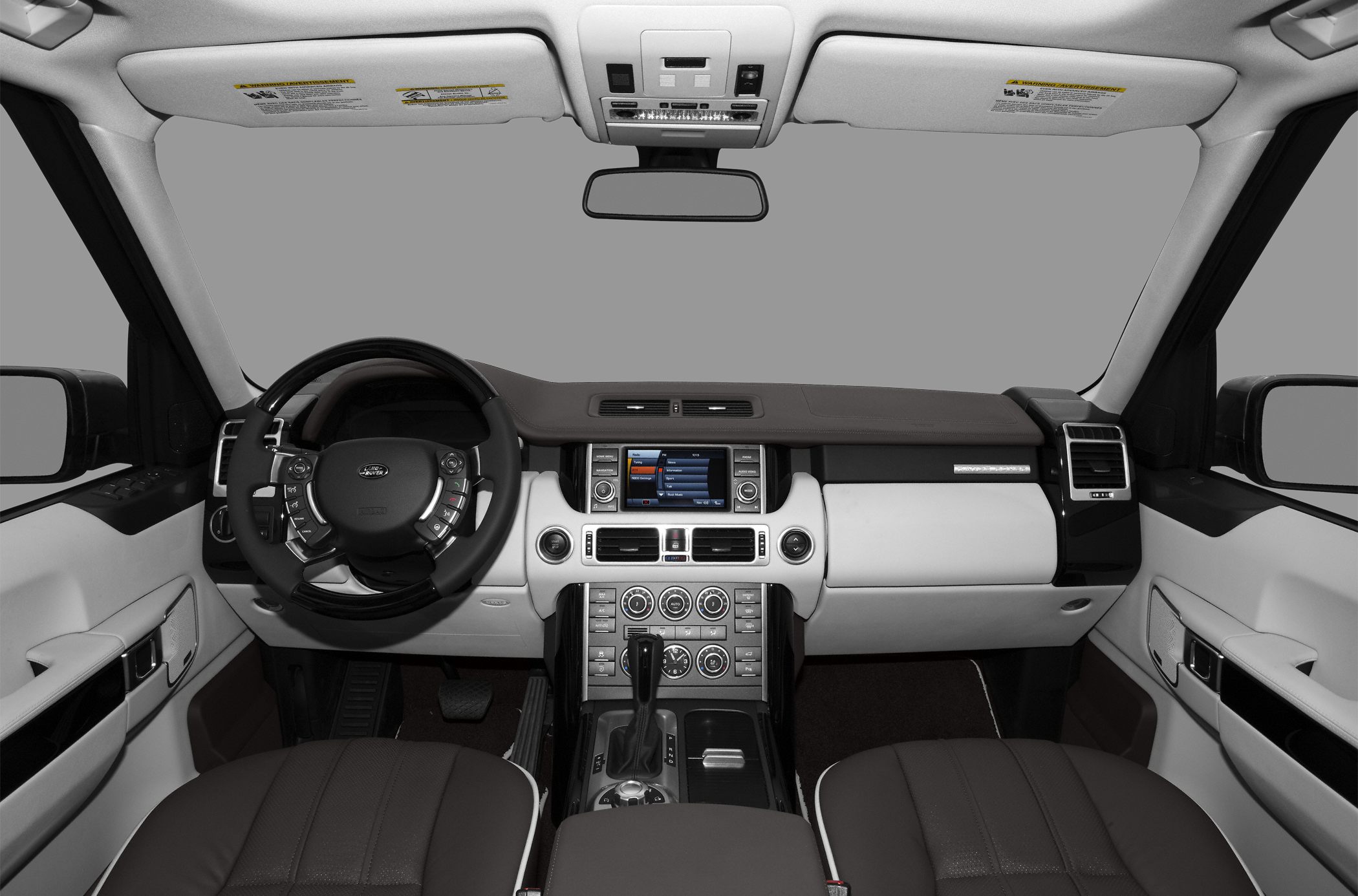 Luxury SUV interior with dashboard and steering wheel controls