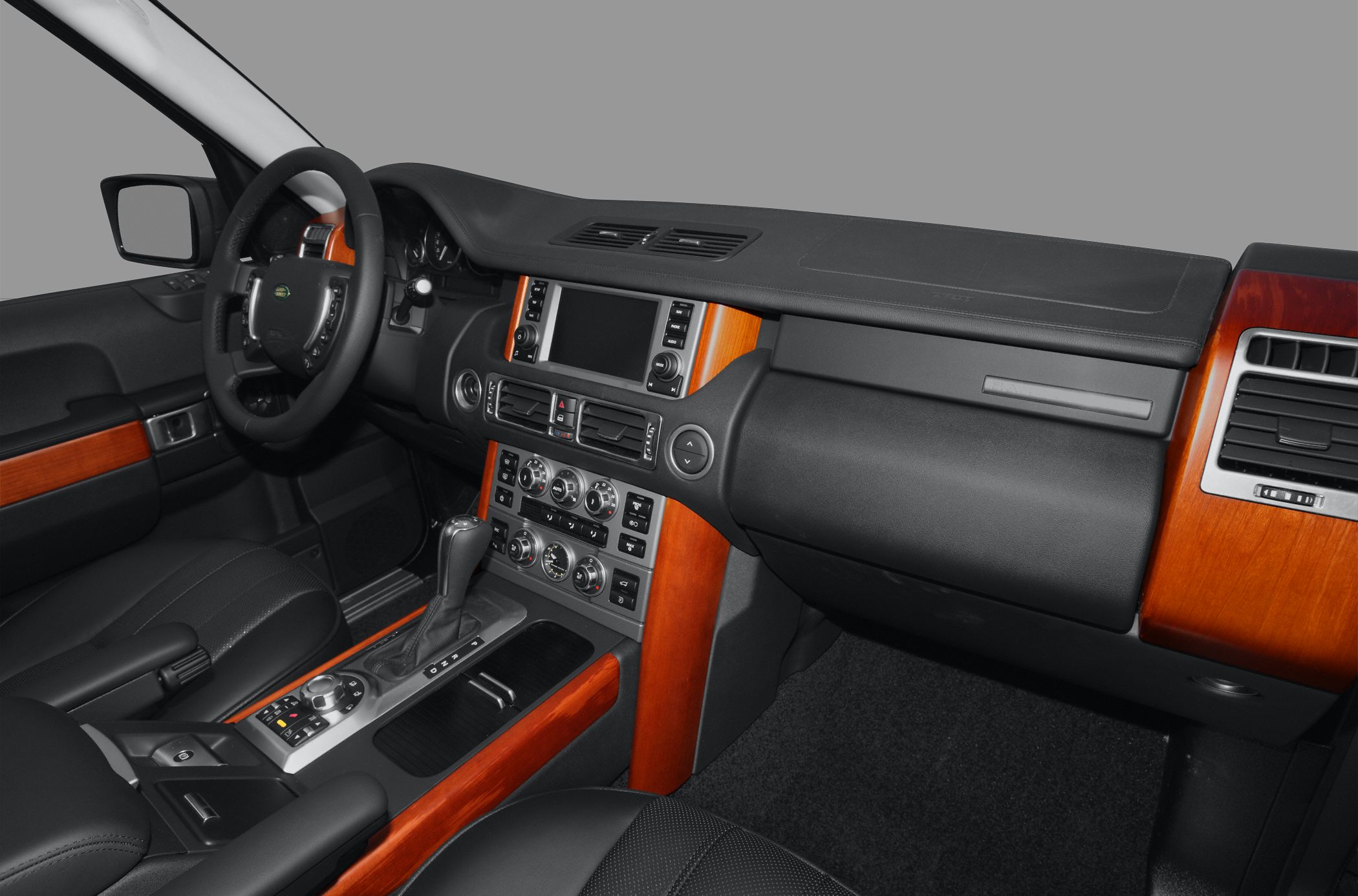 Wood trim dashboard and center console with control panels