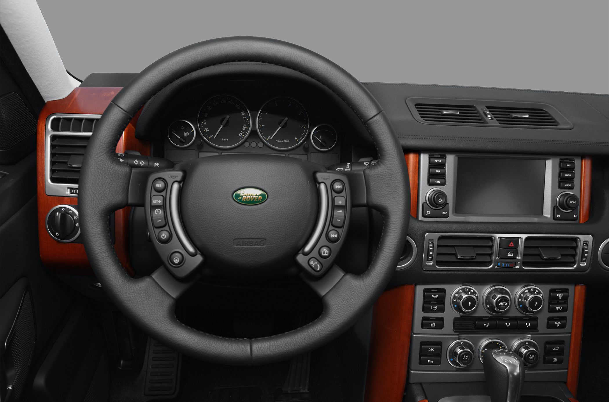 Steering wheel with control buttons and detailed dashboard layout