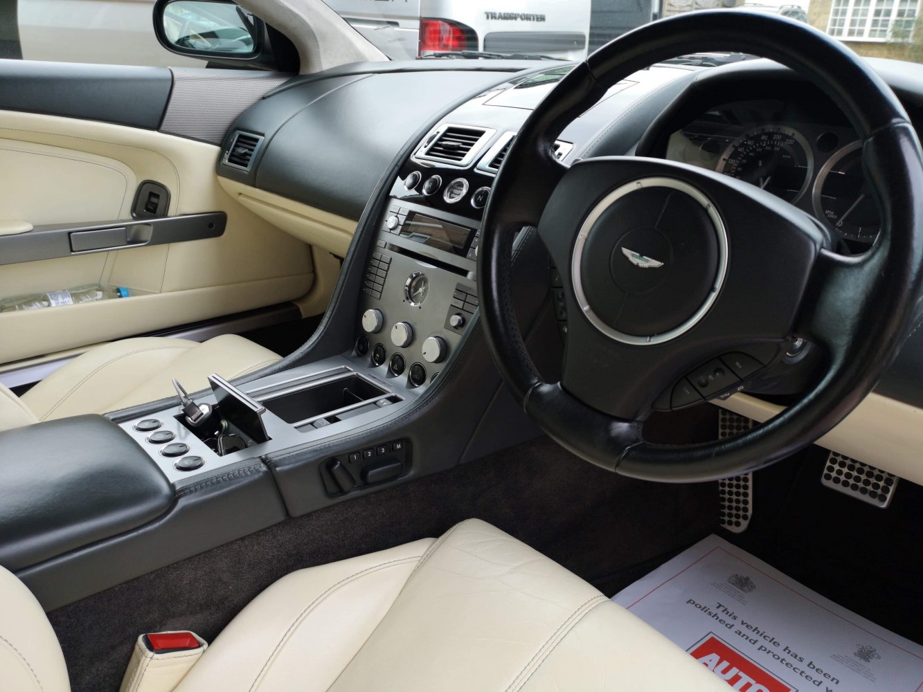 Luxury leather interior with detailed dashboard and steering wheel