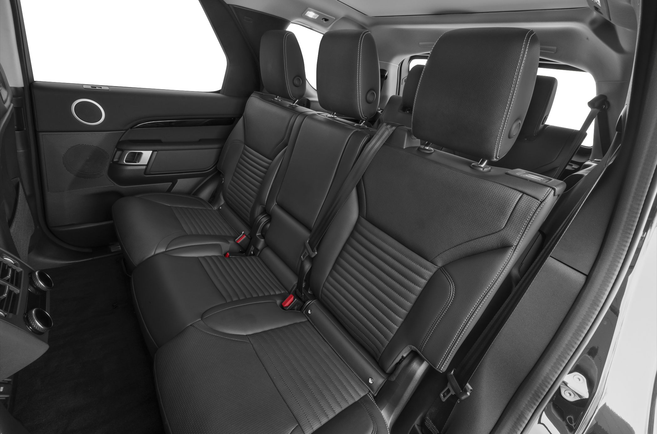 Black leather rear seats with detailed stitching and headrests