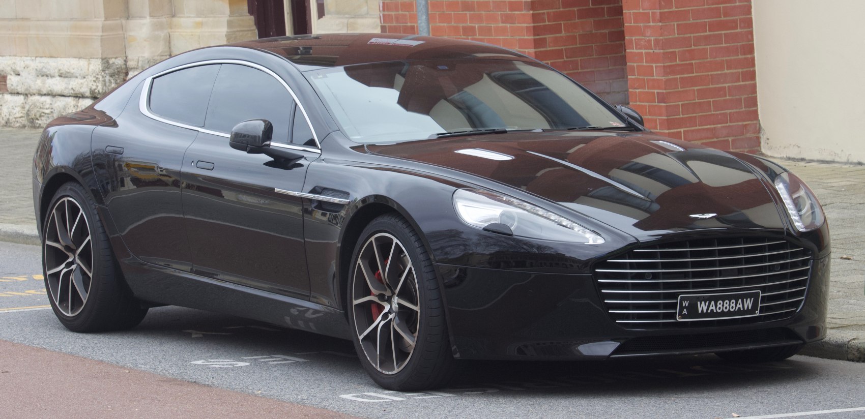 Sleek front side with signature grille and alloy wheels.