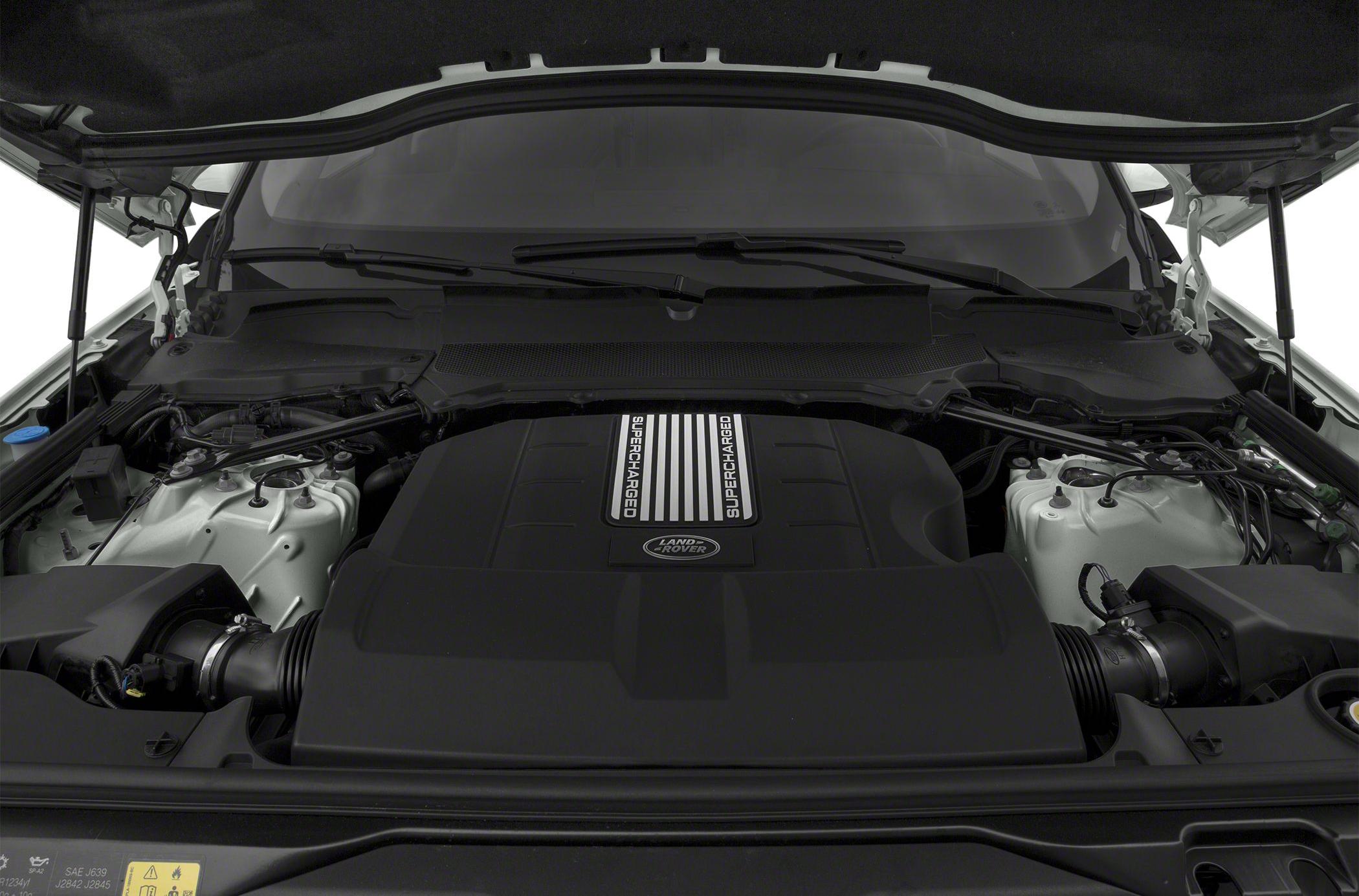 Supercharged engine bay with labeled cover and wiring details