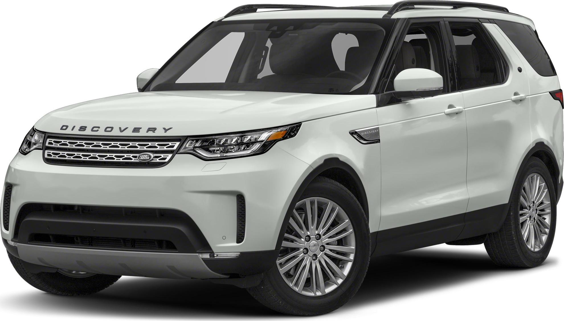 Front grille and side profile of white SUV with alloy wheels and roof rails