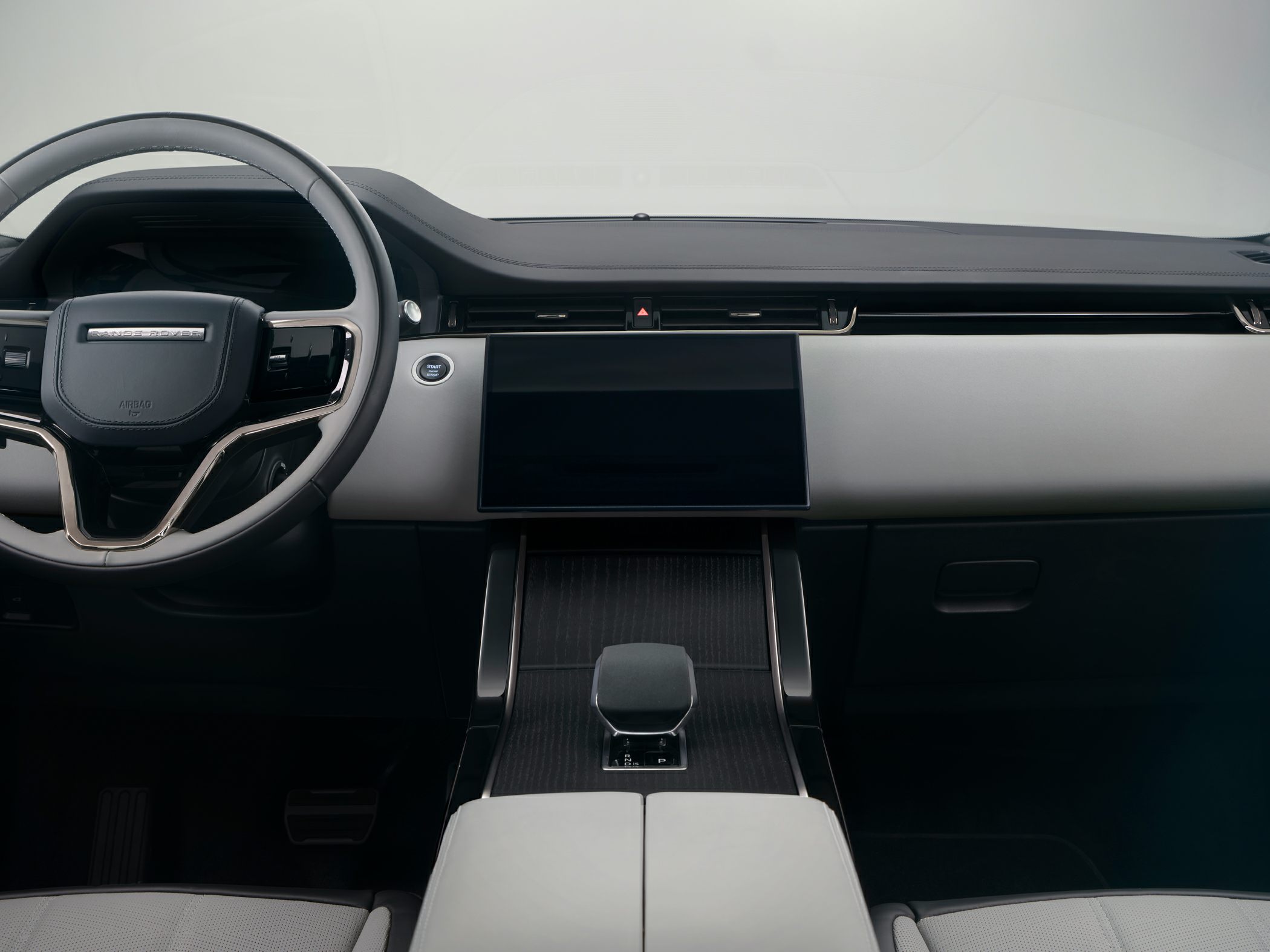 Interior dashboard with touchscreen and modern steering wheel