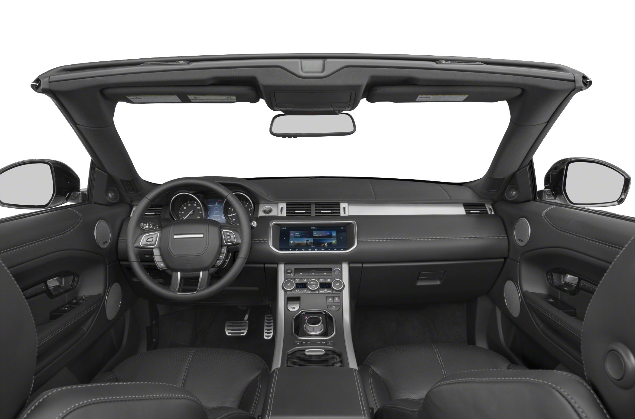 Open-top luxury vehicle interior with modern dashboard and steering wheel